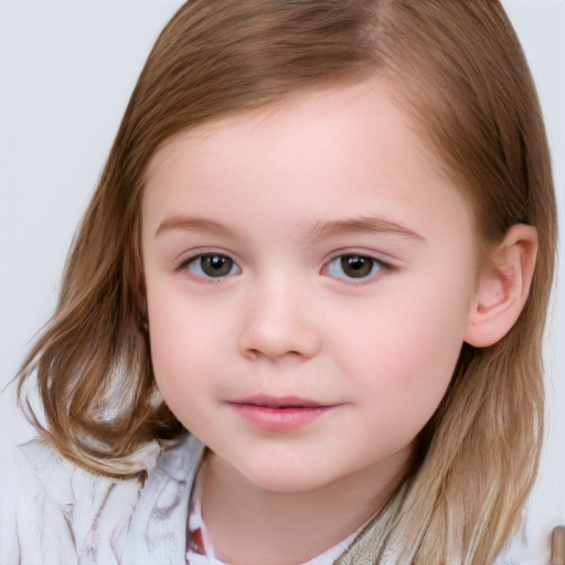 Joyful white child female with medium  brown hair and brown eyes