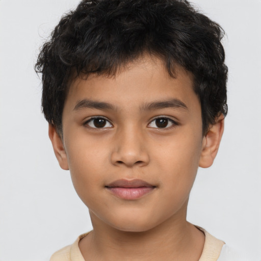 Neutral latino child male with short  brown hair and brown eyes