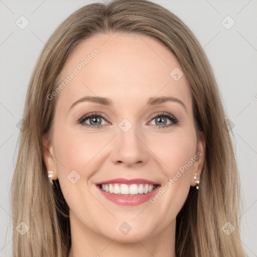 Joyful white young-adult female with long  brown hair and grey eyes