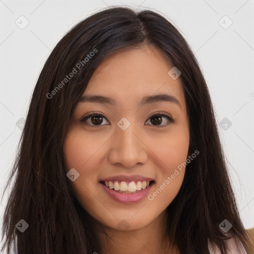 Joyful asian young-adult female with long  brown hair and brown eyes