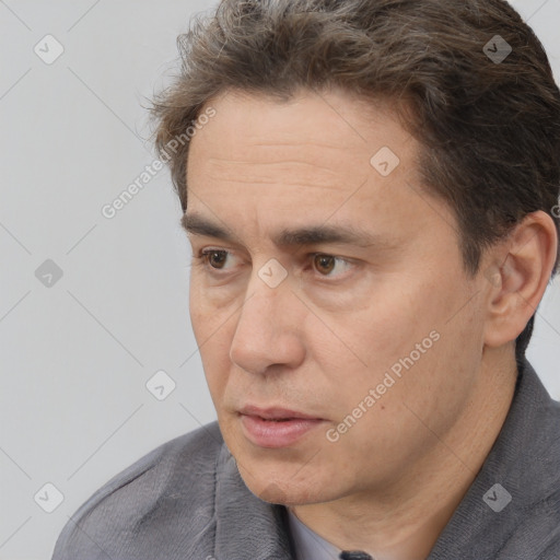 Neutral white adult male with short  brown hair and brown eyes