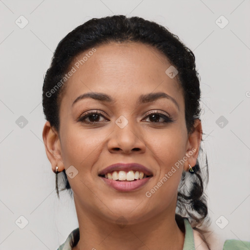 Joyful latino young-adult female with short  black hair and brown eyes