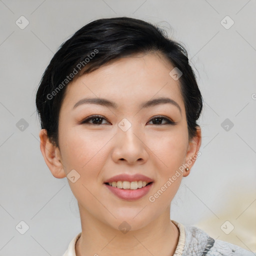 Joyful asian young-adult female with short  black hair and brown eyes