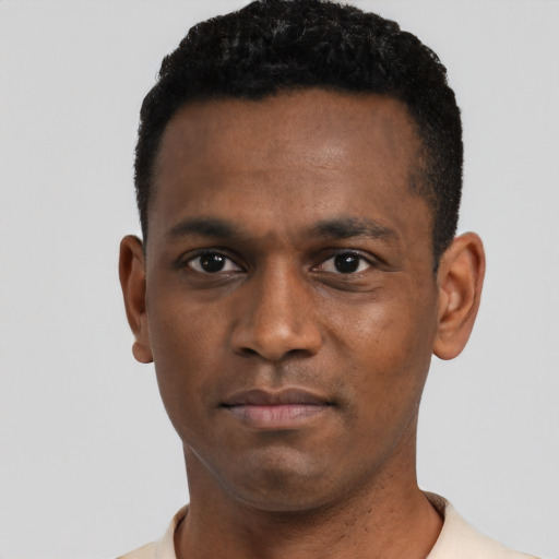 Neutral black young-adult male with short  black hair and brown eyes