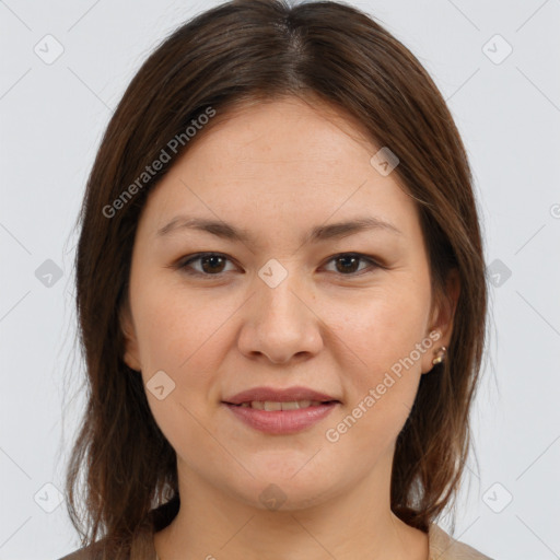 Joyful white young-adult female with medium  brown hair and brown eyes