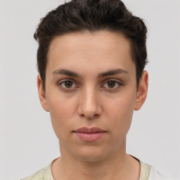 Neutral white young-adult female with short  brown hair and brown eyes