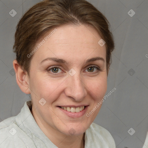 Joyful white adult female with short  brown hair and brown eyes