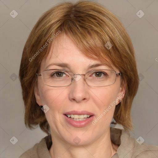 Joyful white adult female with medium  brown hair and blue eyes