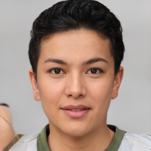 Joyful asian young-adult female with short  brown hair and brown eyes