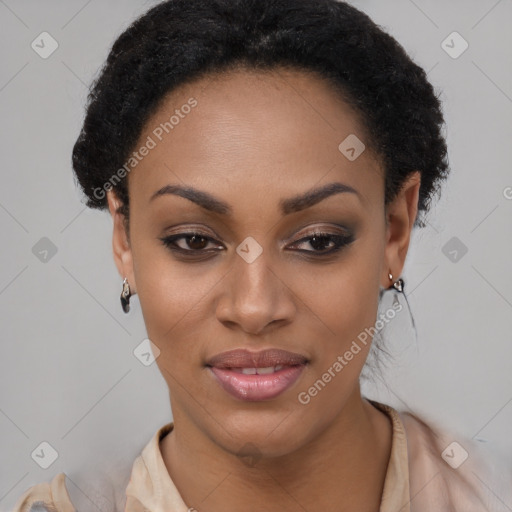 Joyful black young-adult female with short  black hair and brown eyes