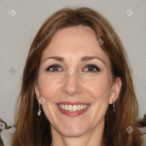 Joyful white adult female with long  brown hair and brown eyes