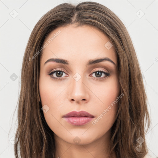 Neutral white young-adult female with long  brown hair and brown eyes