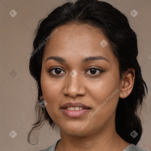 Joyful latino young-adult female with medium  black hair and brown eyes