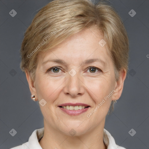 Joyful white adult female with short  brown hair and brown eyes