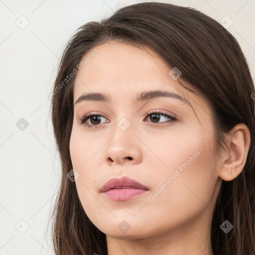 Neutral white young-adult female with long  brown hair and brown eyes