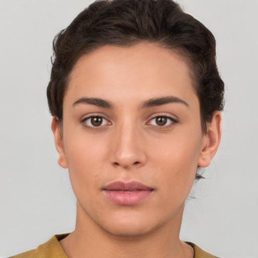 Neutral white young-adult female with short  brown hair and brown eyes