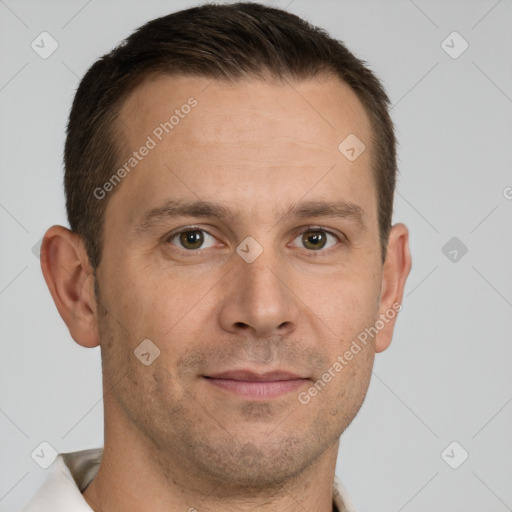 Joyful white adult male with short  brown hair and grey eyes