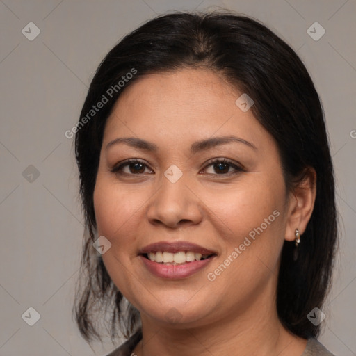 Joyful white young-adult female with medium  brown hair and brown eyes