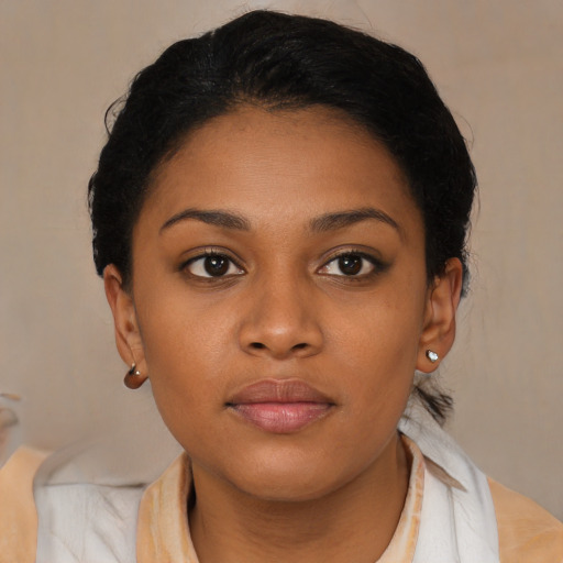 Neutral latino young-adult female with medium  brown hair and brown eyes