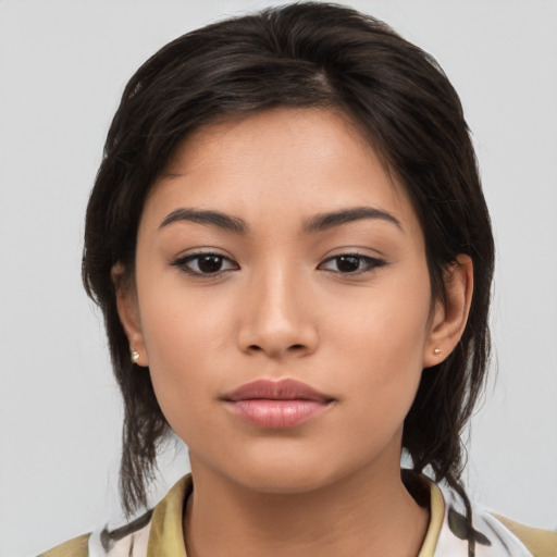 Joyful white young-adult female with medium  brown hair and brown eyes