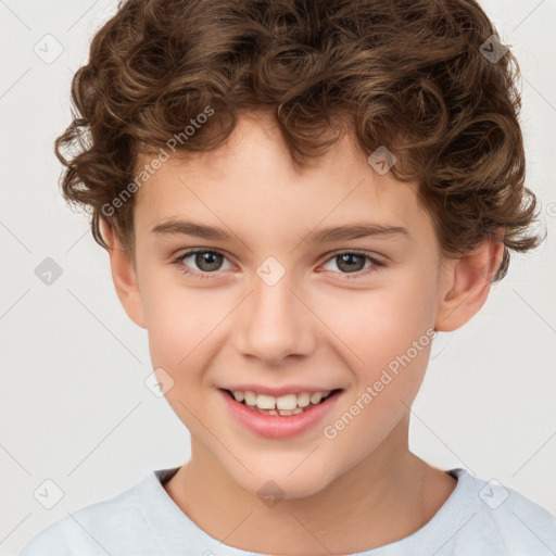 Joyful white child male with short  brown hair and brown eyes