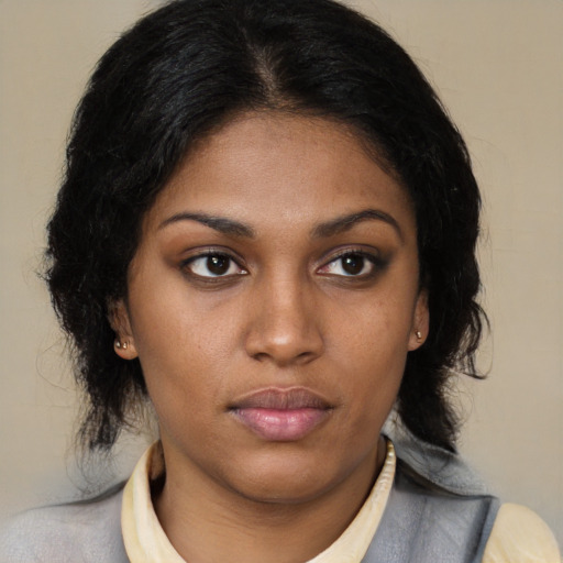 Neutral latino young-adult female with medium  brown hair and brown eyes