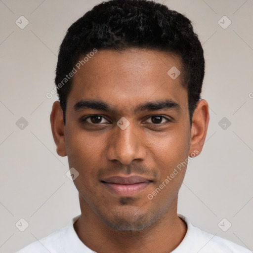 Joyful black young-adult male with short  black hair and brown eyes