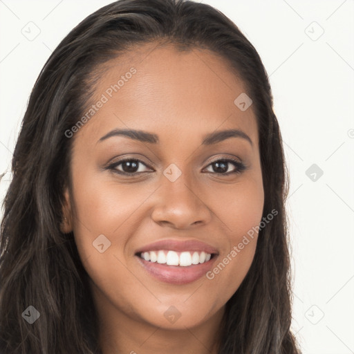 Joyful latino young-adult female with long  brown hair and brown eyes