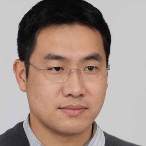 Neutral asian young-adult male with short  brown hair and brown eyes