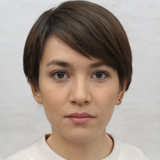 Neutral white young-adult female with short  brown hair and brown eyes