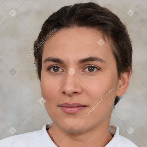 Joyful white young-adult female with short  brown hair and brown eyes