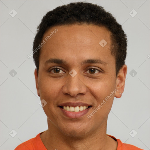 Joyful latino young-adult male with short  brown hair and brown eyes