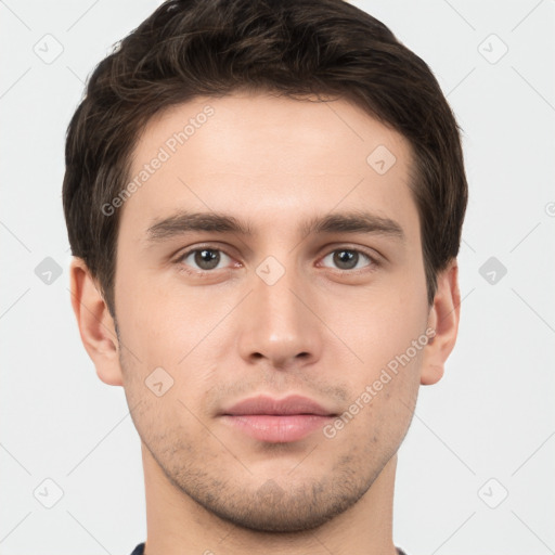 Neutral white young-adult male with short  brown hair and brown eyes