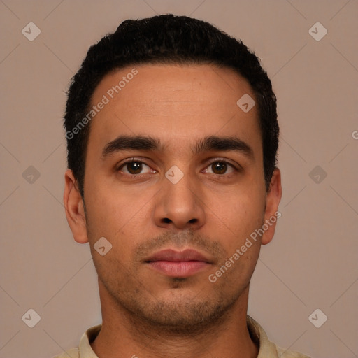 Neutral latino young-adult male with short  black hair and brown eyes