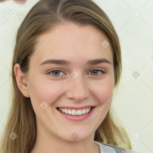 Joyful white young-adult female with long  brown hair and green eyes