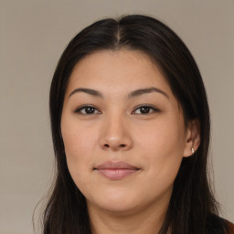 Joyful asian young-adult female with long  brown hair and brown eyes