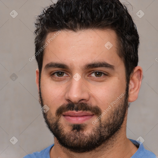 Neutral white young-adult male with short  black hair and brown eyes