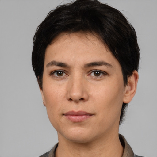 Neutral white young-adult female with short  black hair and brown eyes