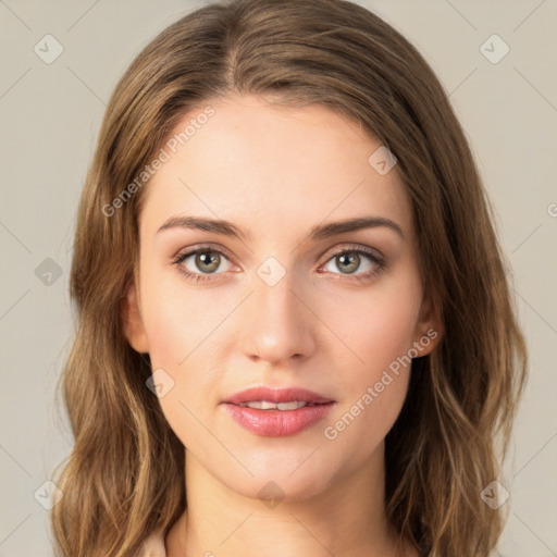 Joyful white young-adult female with long  brown hair and green eyes