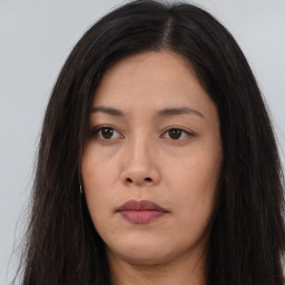 Neutral asian young-adult female with long  brown hair and brown eyes