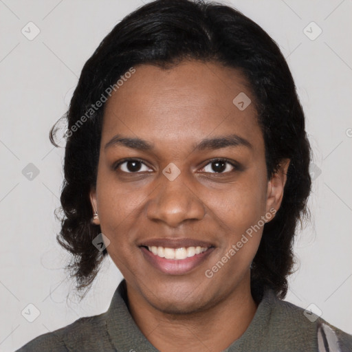 Joyful black young-adult female with medium  black hair and brown eyes