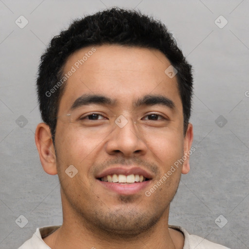 Joyful white young-adult male with short  black hair and brown eyes