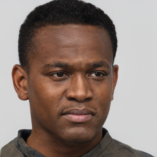 Neutral black young-adult male with short  brown hair and brown eyes