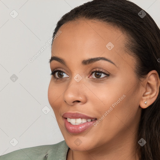 Joyful white young-adult female with long  brown hair and brown eyes