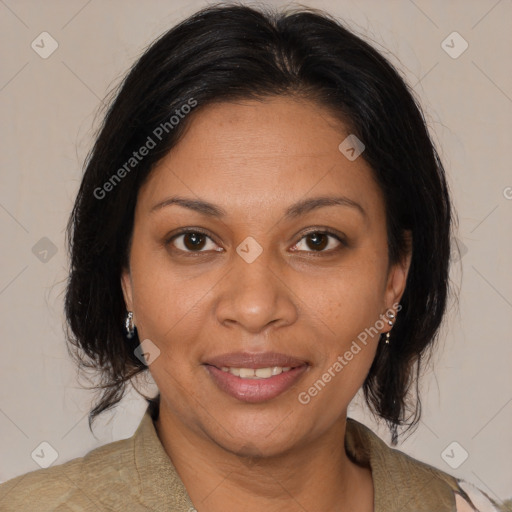 Joyful black adult female with medium  brown hair and brown eyes