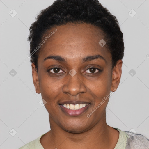 Joyful black young-adult female with short  black hair and brown eyes