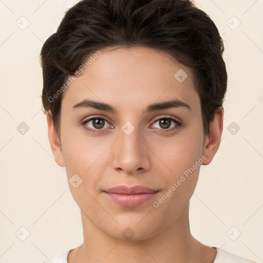 Joyful white young-adult female with short  brown hair and brown eyes