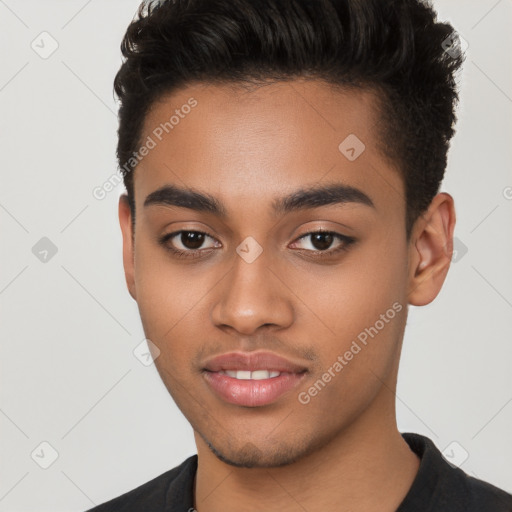 Joyful latino young-adult male with short  brown hair and brown eyes