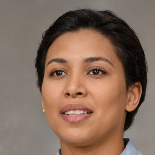 Joyful asian young-adult female with medium  brown hair and brown eyes