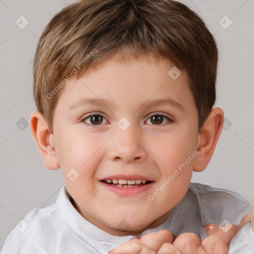 Joyful white child male with short  brown hair and brown eyes